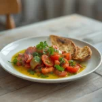 Fattoush Salad: A bright bowl of Fattoush Salad with crispy pita, fresh cucumbers, tomatoes, and glistening olive oil dressing.