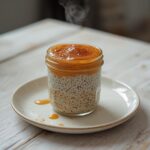 Almond Butter Chia Jars: Creamy almond butter chia pudding in a clear jar with a toasted almond topping for a keto snack.