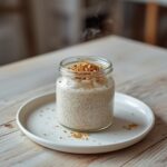 Chia Hemp Seed Pudding: Creamy chia hemp seed pudding in a jar with toasted hemp seeds on top, keto breakfast concept.