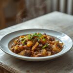 Crack Slaw Cabbage Stirfry: Crack Slaw Cabbage Stirfry in a skillet with glistening beef and tender cabbage, a keto dinner idea.
