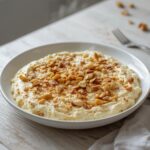 Nut Seed Cottage Mix: A creamy bowl of cottage cheese mixed with toasted nuts and seeds, perfect for a keto breakfast.
