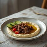 Spiced Beef Hummus Plate: Spiced beef hummus plate with creamy hummus, crispy beef, and fresh veggies for a keto snack.