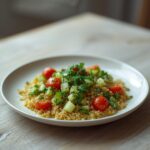 Tabbouleh With Fresh Parsley: Fresh tabbouleh salad with chopped parsley, bulgur, tomatoes, and cucumber in a bowl, glistening with lemon dressing.