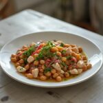 Tuna White Bean Salad: A bright bowl of Tuna White Bean Salad with beans, tuna, red onion, and parsley glistening with lemon vinaigrette.