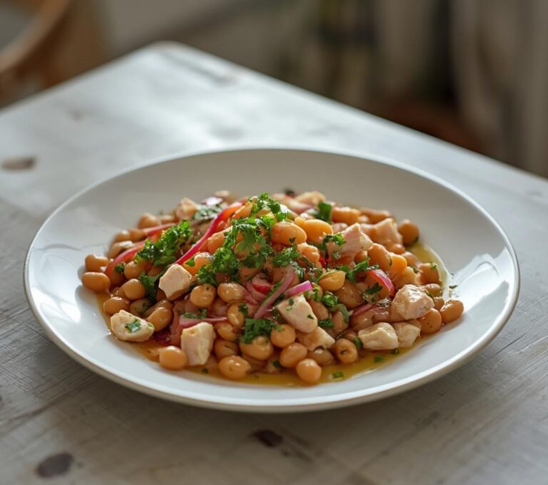 Home 9 Tuna White Bean Salad: A bright bowl of Tuna White Bean Salad with beans, tuna, red onion, and parsley glistening with lemon vinaigrette.